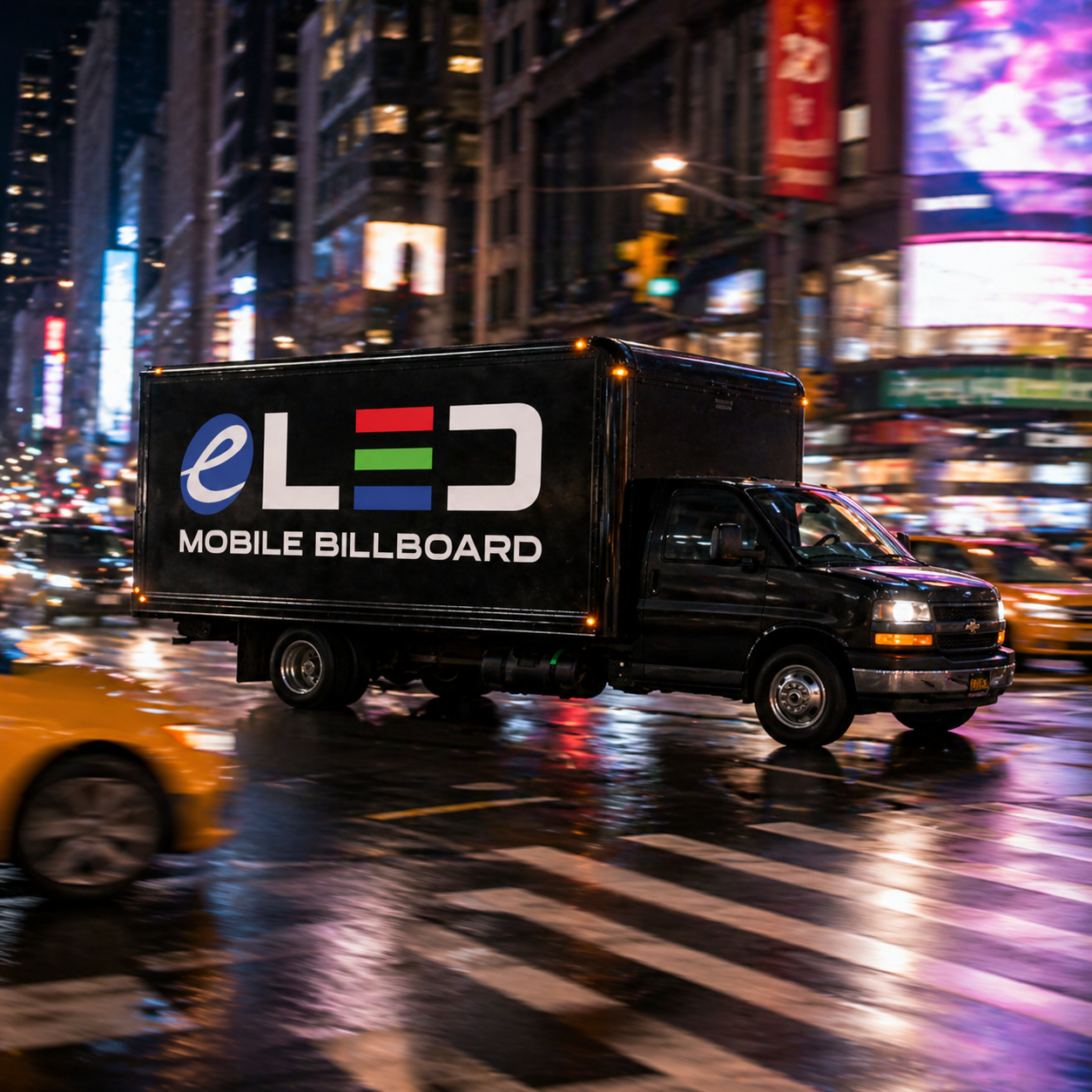 ELED LED billboard truck at night displaying brand advertising